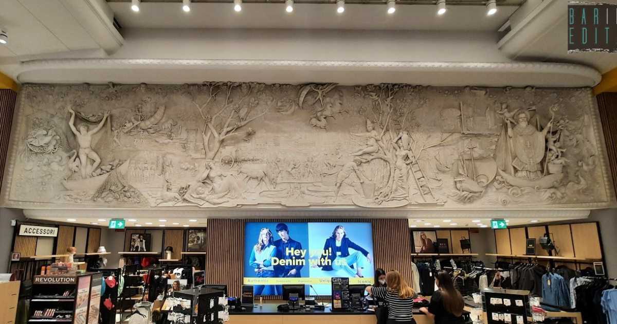La grande arte in un negozio di vestiti: nell'Ovs un'opera degli anni 50 racconta la storia di Bari 